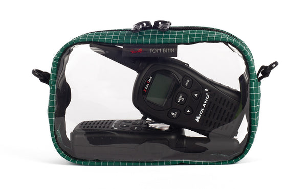 A Sitka (dark green) with white grid pattern (Halcyon) 3D Clear Organizer Cube filled with sundries.